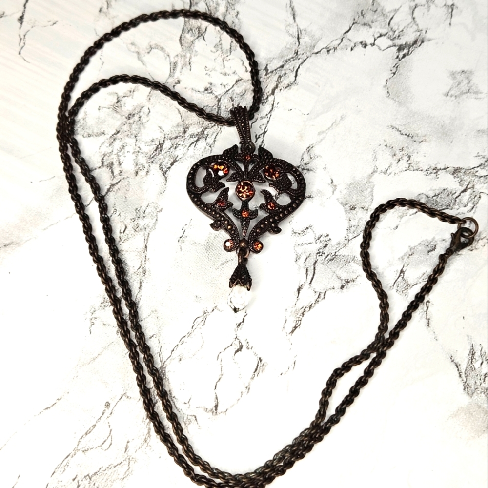 Victorian Brown Filigree heart with Rhinestones.